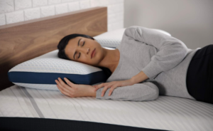 Woman resting on Serta iComfort Carbon Fiber Memory Foam Pillow